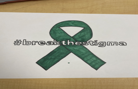 The green ribbon for mental health awareness. 